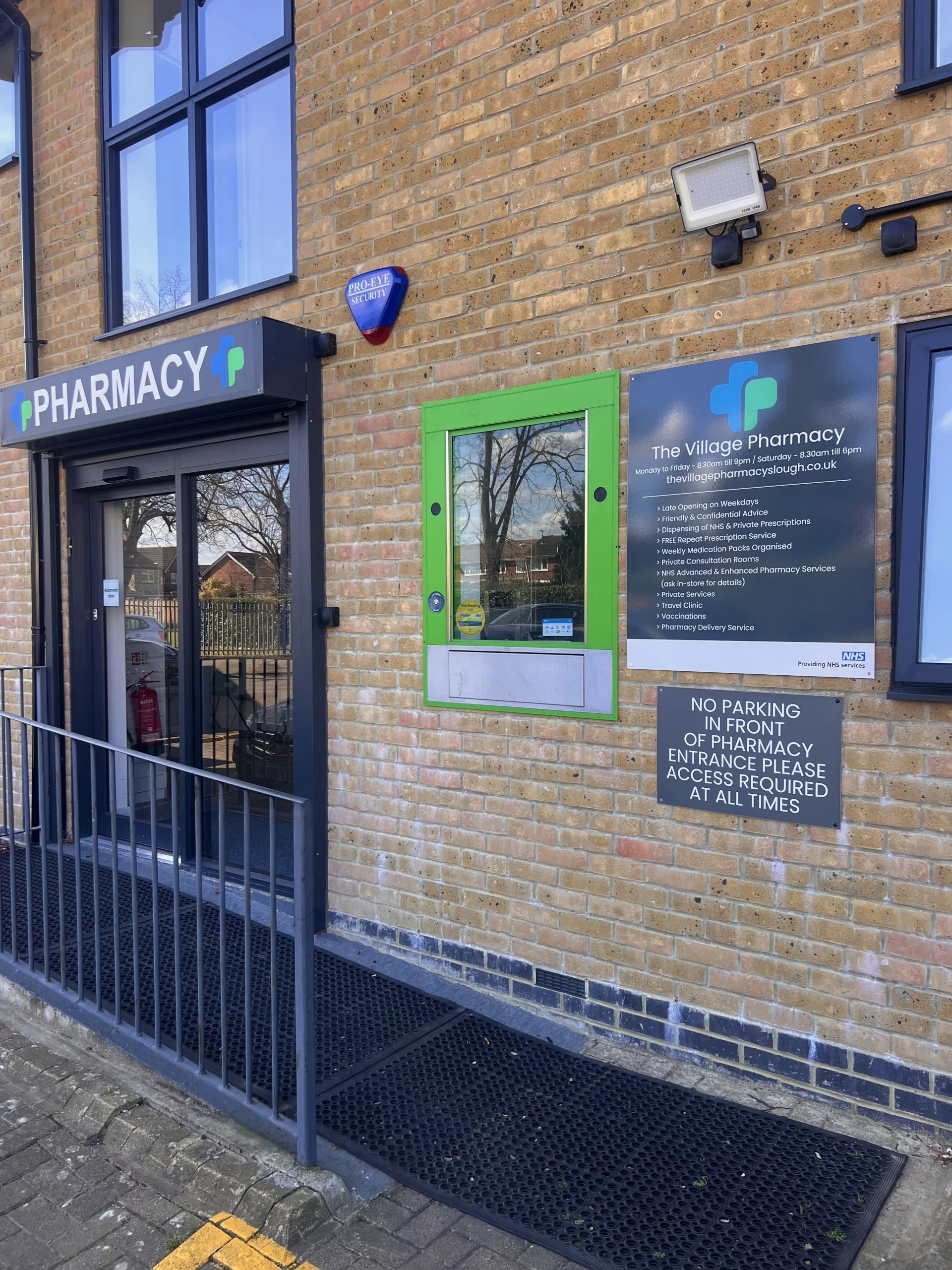 A happy family running together on grassy hill